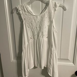 white tank with detailing